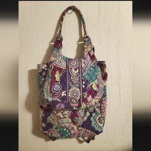 Vera Bradley quilted purse with backpack straps or handle.